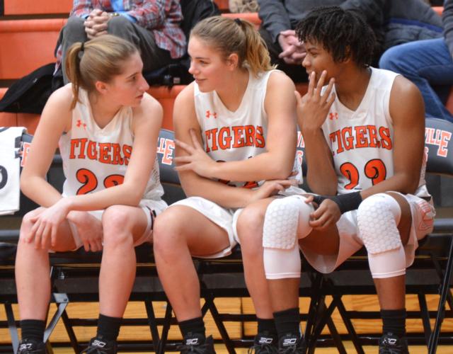 Kate Martin, Rachel Pranger and Myriah Noodel-Haywood wait their turn to be recognized on Senior Night.