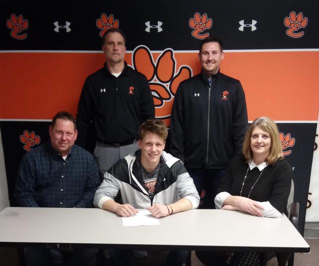 Front (L-R): Roger Strohmeier (dad), Ryan Strohmeier, Jeanie Strohmeier (mom) Back (L-R): Matt Martin, assistant coach Mike Corey.