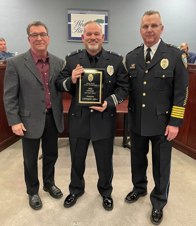 Detective Christopher S. Alfaro, the Wood River Police Officer Of The Year (center).