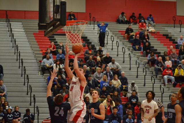 Alton's Bryan Hudson seems to be continually around the rim and is one of the Redbirds' top dunk artists.