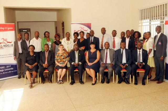 SIUE’s Kathy Brady, PhD, and Michelle Cathorall, DrPH, sit alongside dignitaries of Ndejje University.