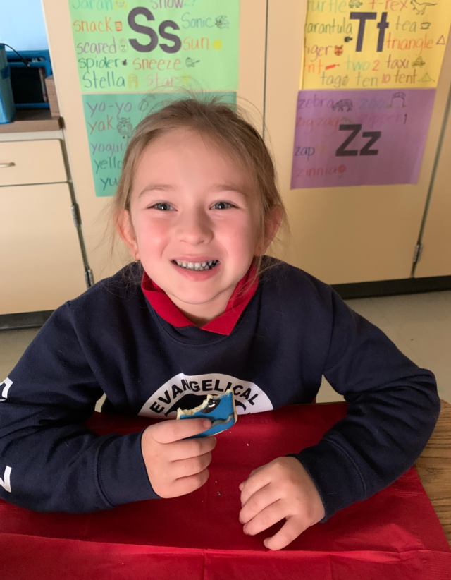 Evelyn Funk with a 100-day cookie.