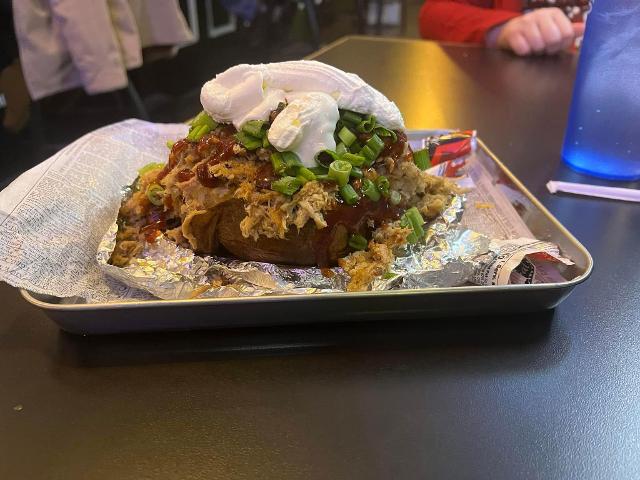Pulled pork stuffed potato.
