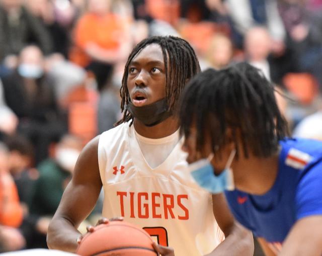 Edwardsville's Malik Allen eyes the basket for a free throw against the Flyers on Friday night. (Photo by Dan Brannan)