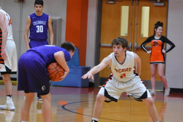 Jack Marinko defends against Collinsville on Tuesday night. (Photo by Dan Brannan)