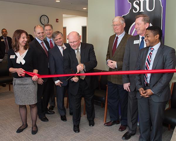 (L-R): Jennifer McClure, SIUE Marketing & Communications; Dr. Ken Rawson, SIU SDM associate dean; Dr. Randy Dunn, SIU system president; Dr. Randy Pembrook, SIUE chancellor; Dr. Bruce Rotter, SIU SDM dean; Illinois State Senator Bill Haine; Rich Walker, SIUE interim vice chancellor for administration; and Kevin Brooks, representing U.S. Senator Tammy Duckworth. 