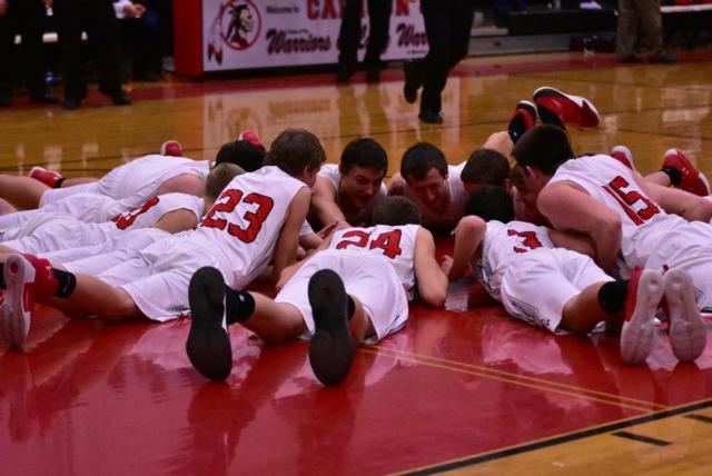 The Warriors gather together before the game against Griggsville. Shown are an array of photos by Riverbender.com's Alison Godar of Senior Night.