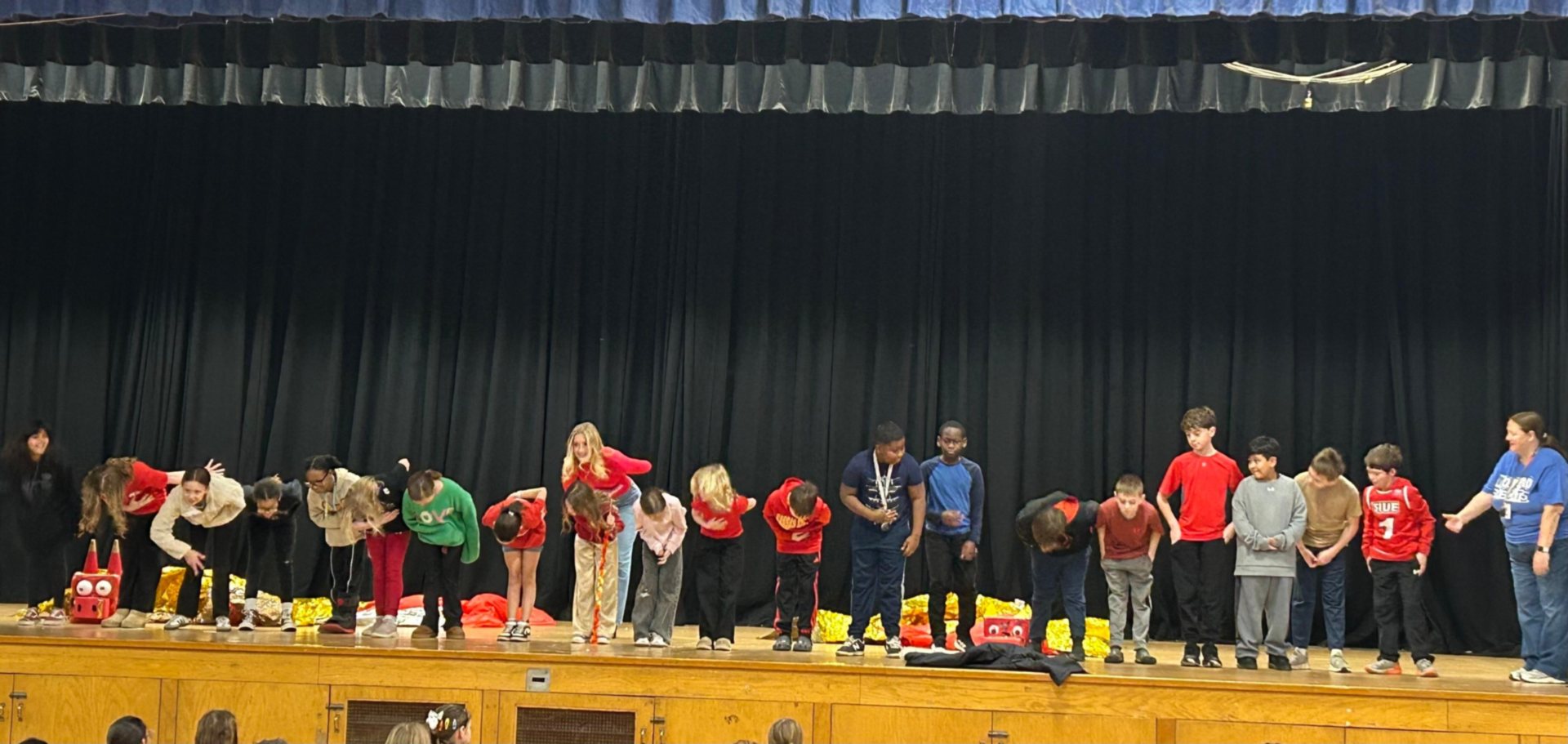 Students bowed to their classmates following the presentation.