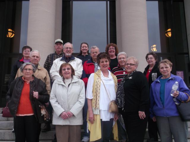 Picture perfect three years ago! JPRD day-trippers gather for a photo in front of the Missouri History Museum for a snap shot during the department's first-ever day trip back on 2.28.2012. (First row from left to right) Helen Meuth, Geraldine Gunther, Jane Hellrung, Wanda Groppel and Carolyn Ruland. (Second row from left to right) Cletus Meuth, William Gunther, Wilbert Sackman, Barbara Sackman and Alice Anderson. (Third row from left to right) Yvonne Baecht, George Baecht, Angela Sullivan and Marie Mangrum.
