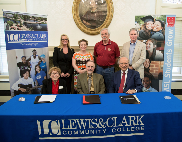 L&C and UMSL signed a new transfer agreement Monday, Feb. 20, that will help provide a seamless transfer between the two institutions for Criminal Justice students. Pictured from top left, L&C Criminal Justice Professor Tricia Martin; L&C Criminal Justice Program Coordinator Jessica Noble; UMSL Department of Criminology and Criminal Justice Chair Dr. Finn Esbensen; UMSL Undergraduate Director of Criminology and Criminal Justice Dr. Tim Maher; Bottom row from left, L&C Vice President of Academic Affairs Dr. Linda Chapman; UMSL Chancellor Tom George; and L&C President Dr. Dale Chapman. Photos by L&C Media Specialist Louise Jett