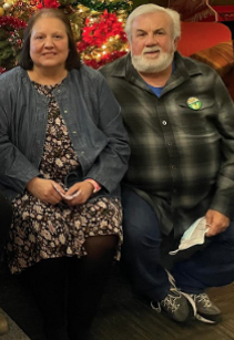 Teresa and Dwight Fowler at Christmas time at the Riverbend Community Center Toy Giveaway.