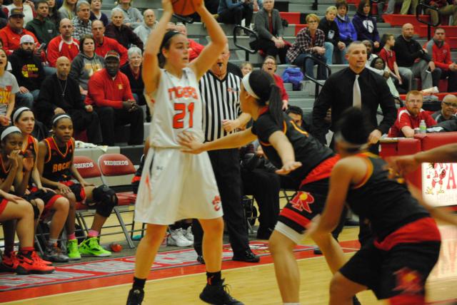 Rachel Pranger pulls up looking for a teammate on Thursday night in the Alton High Sectional game. (Photo by Brent Feeney)
