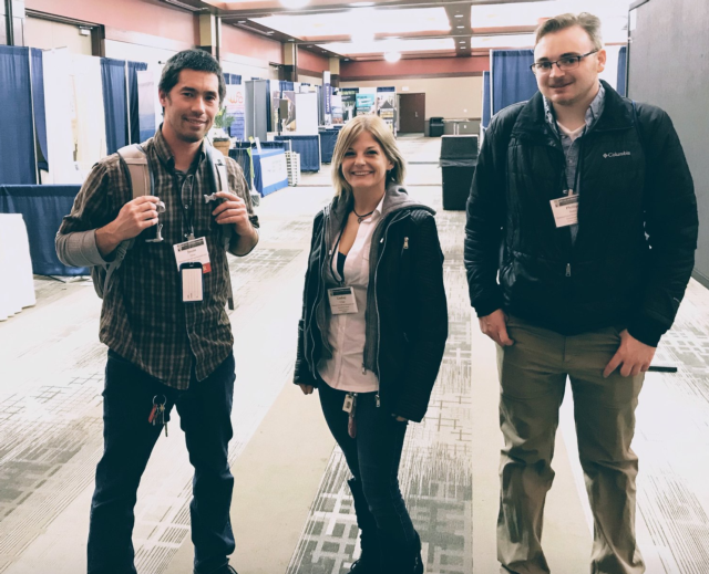 NGRREC Conservation Program Manager Justin Shew, left, NGRREC Habitat Strike Team (HST) Senior Assistant Lindsay Griggs, center, and L&C Restoration Ecology Student and NGRREC HST Intern Philip Rathz, right, pause after a long day of learning and networking at the Midwest Fish and Wildlife Conference. in Springfield, Illinois, Jan. 27.
