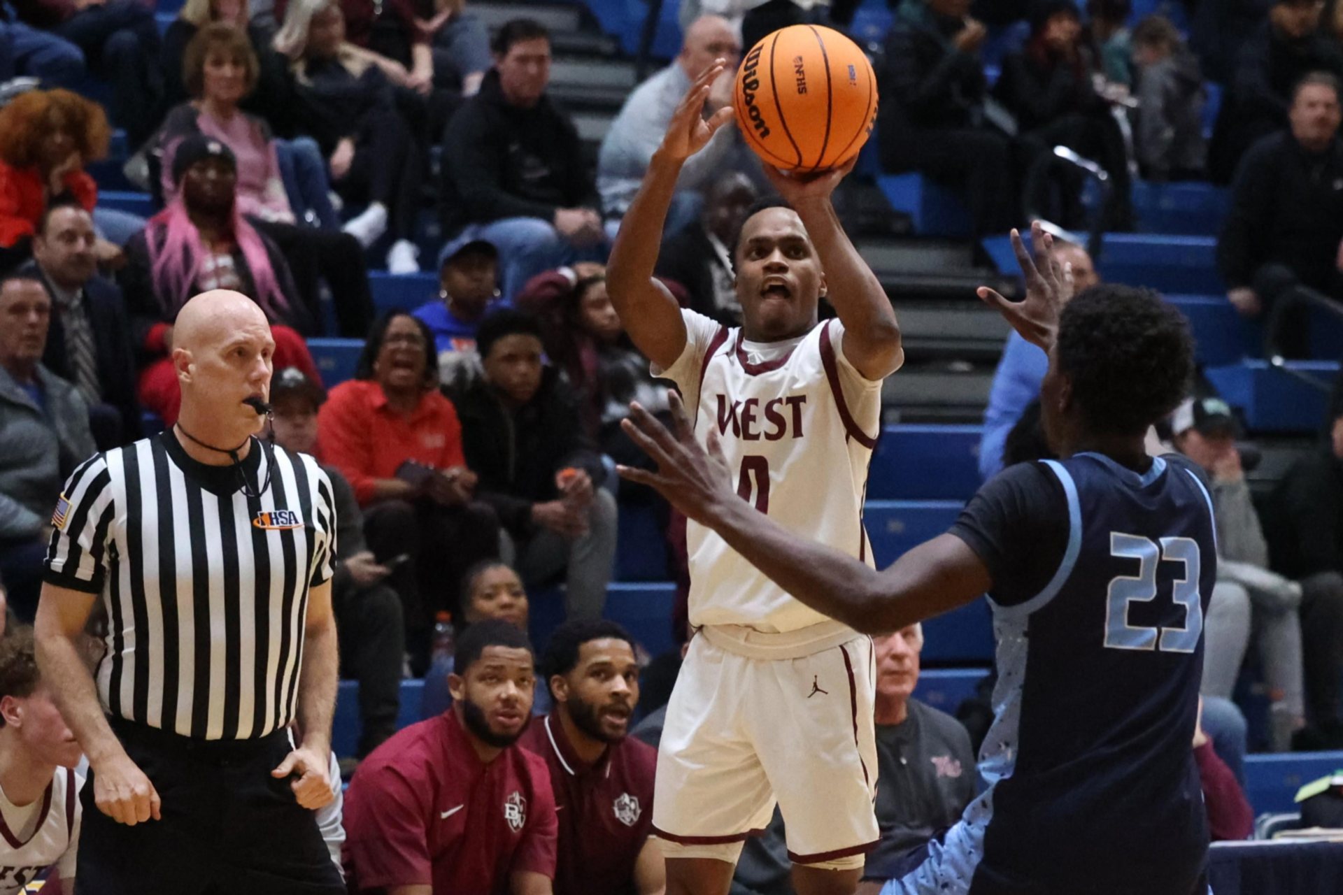 Belleville West’s Ricky Salmond III knocks down a three-pointer against cross-town rivals Belleville East Wednesday night in an IHSA regional semifinal at O’Fallon Township High School. (Photo by Brad Piros)
