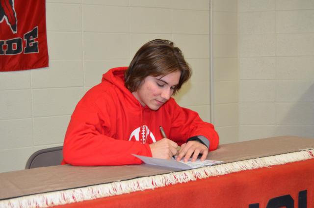 Calhoun's Brandon Kizer signs with Monmouth College.