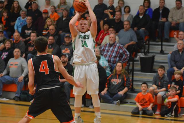 Carrollton's Cole Brannan fires for two of his game-high 21 points on Friday night. (Photo by Dan Brannan)