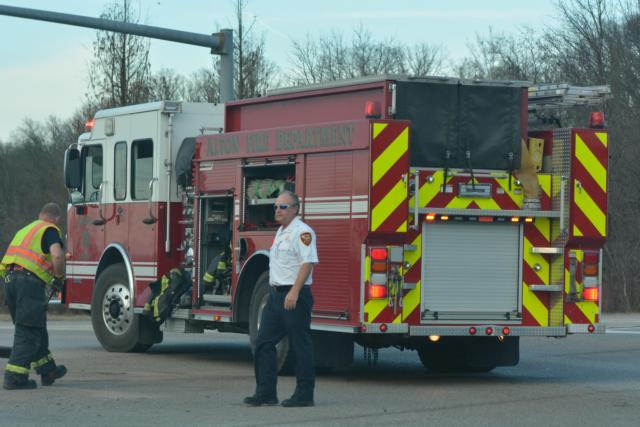 Alton Fire Department Battalion Chief Brad Sweetman assesses the situation of a three-car collision on Monday afternoon. (Photo by Dan Brannan)