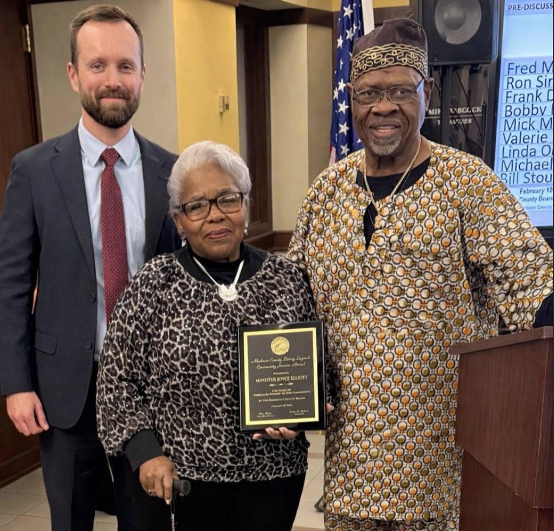  Chairman Chris Slusser, Pastor Joyce Elliott and County Board Member Michael &ldquo;Doc&rdquo; Holliday of Alton. Elliott received the annual Living Legend Award for her leadership, compassion and commitment to the community,