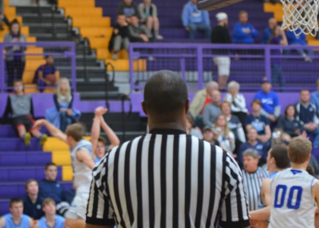 Jersey Blake Wittman's release of the winning basket. (Photo by Dan Brannan)