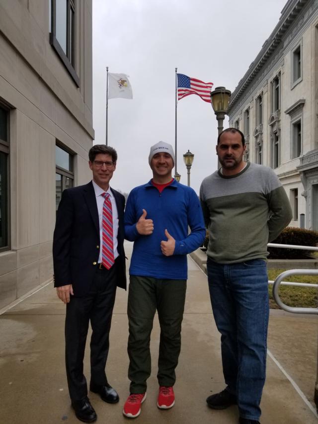  U.S. Army veteran Steve Meyer (center) stops on Tuesday to visit with Madison County Board Chairman Kurt Prenzler (left) and Veterans Assistance Commission Superintendent Brad Lavite to talk about his walk across the county to raise awareness for post-traumatic stress disorder (PTSD.)