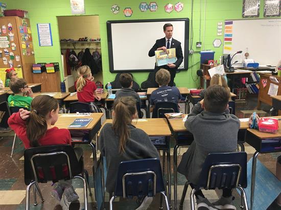 Rep. Rodney Davis reads to a third grade class at St. Francis Holy Ghost School in Jerseyville on Read Across America Day last year. 