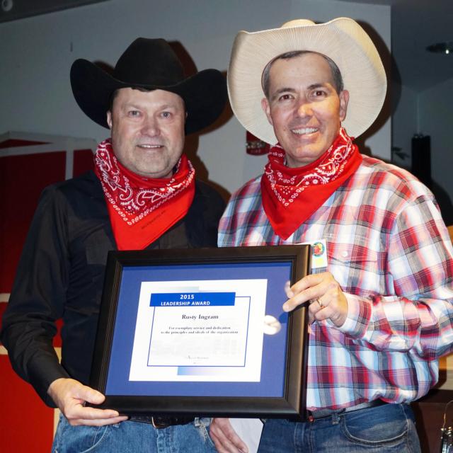 Leadership Award winner Rusty Ingram with AMH President Dave Braasch.