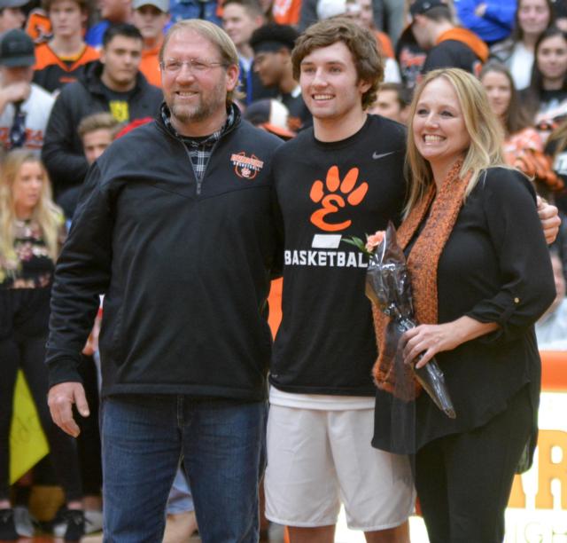 Tigers' star guard Jack Marinko stands with his parents recently on Senior Night at EHS. All the photos below were taken on Senior Night. (Photos by Dan Brannan)