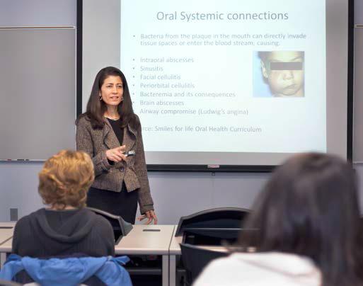 Dr. Poonam Jain, practicing dentist from Staunton and director of the Southern Illinois University School of Dental Medicine' s Community and Preventive Dentistry Program, gives a presentation to Lewis and Clark Community College nursing students about the importance of dental care to overall health care of patients of all ages. Photo by S. Paige Allen, Lewis and Clark Community College photographer.