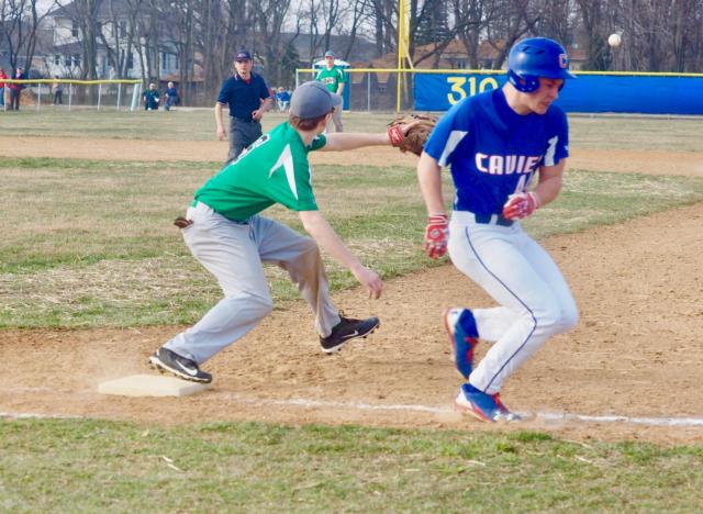 Carlinville's Garrett Campbell (44) beats out a throw to avoid a double-play before Kyle Waters (6) catches the ball.