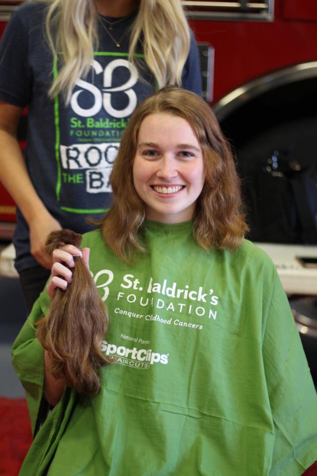 Jessica Luer underwent a huge transformation in honor of her brother, Ryan, who was recently diagnosed with Ewing Sarcoma. She didn't go for the big shave (yet), but she raised over $2,600 for St. Baldrick's in the meantime.