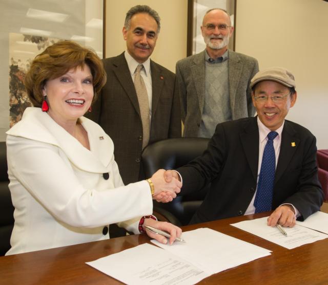 (L-R): SIUE Chancellor Julie Furst-Bowe and Prof. L.S. Chan, Deputy Director/College principal at Hong Kong University SPACE. Standing: Provost and Vice Chancellor for Academic Affairs Parviz Ansari and Ron Schaefer, Director of International Programs.