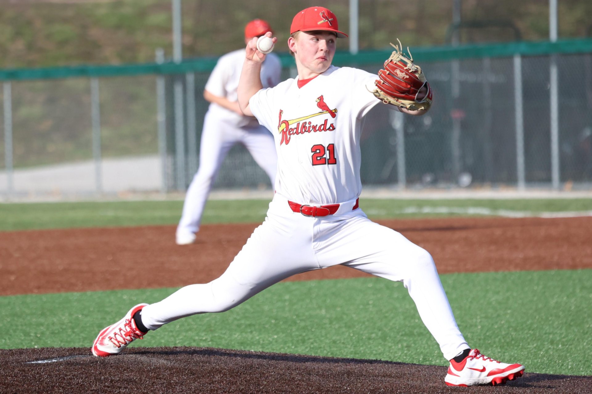 Alton junior Donavon Ducey on the mound against the Oswego Panthers Friday, March 20 at Alton High School. (Photos by Brad Piros)