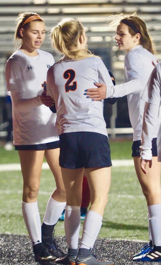 Hannah Biliecke (left) and Kiara Delagado console Ezri Beckman after she took a knock to the face.