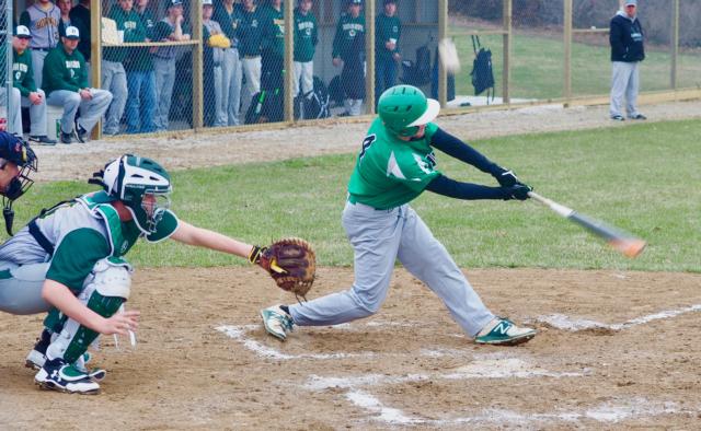 Ethan Brannan (4) fouls off a pitch.