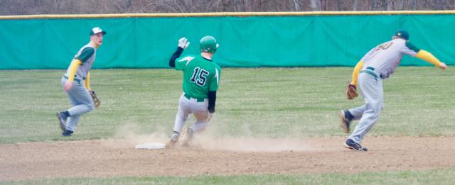 Nathan Walker steals second base with Darian Drake (30) making a defensive catch.