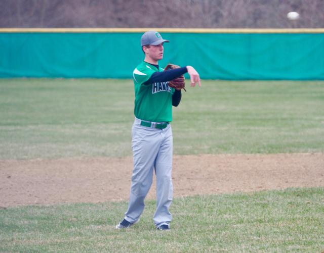 Kolten Bottom throws the baseball to Alex Bowker after a strikeout.