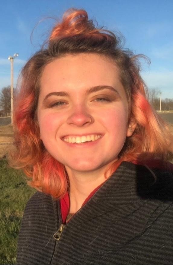 Me, on a walk, in 2020. Note the pink hair. It was a wild time.