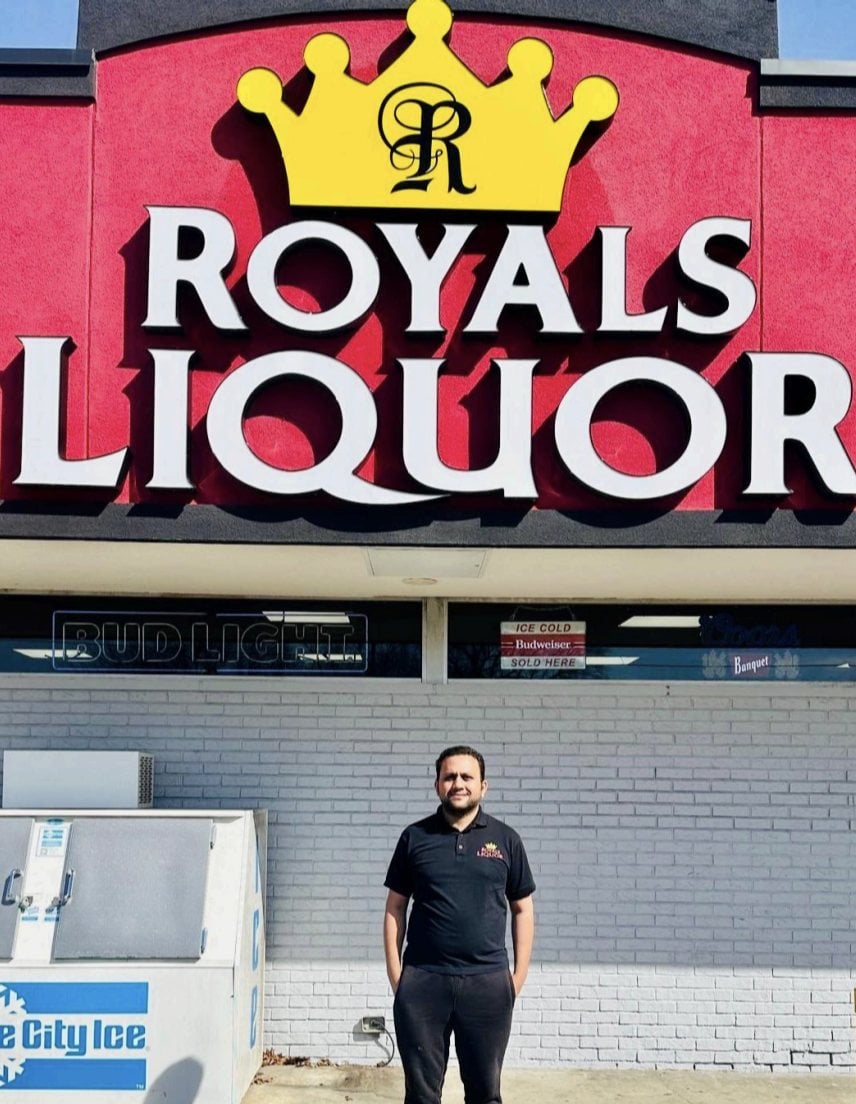 Bhavik Patel, co-owner of Royals Liquor in Belleville, takes a celebratory photo after selling a winning Lotto ticket worth a whopping $5.6 million.