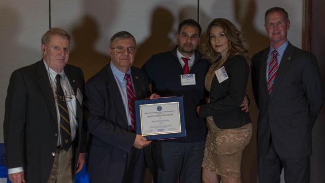 Juan Vasquez, nominator of Baxter International, Inc. poses with wife Maritza at the Employer Support of the Guard and Reserve awards banquet, in Springfield, Illinois, March 23. Vasquez nominated his employer for the Above & Beyond Award from the ESGR. (U.S. Army Photo by Sgt. Stephen Gifford, Illinois National Guard Public Affairs)