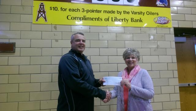 East Alton-Wood River High School – EAWR Assistant Principal Kevin Gockel and Liberty Bank’s Pat Kimbro