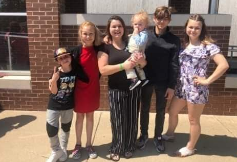 Lacey with her family at graduation from drug court