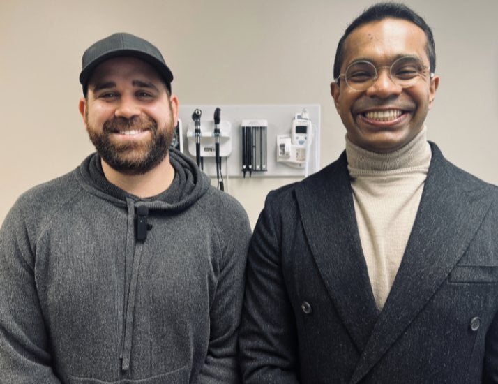 Portrait photo of patient Tyler Stratman next to Dr. Sohail Syed