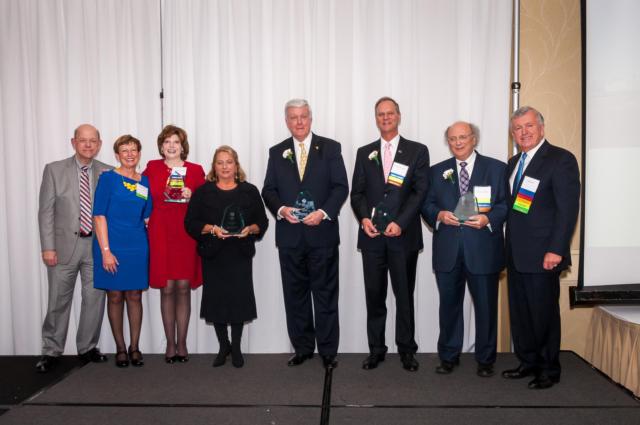 L to R - Emcee Pat Gauen; Leadership Council Executive Director Ellen Krohne; Dr. Julie Furst-Bowe, Dr. Georgia Costello, Dr. Jim Dennis, Dr. Jerry Bladdick, Dr. Dale Chapman and Leadership Council President Mike Riley.