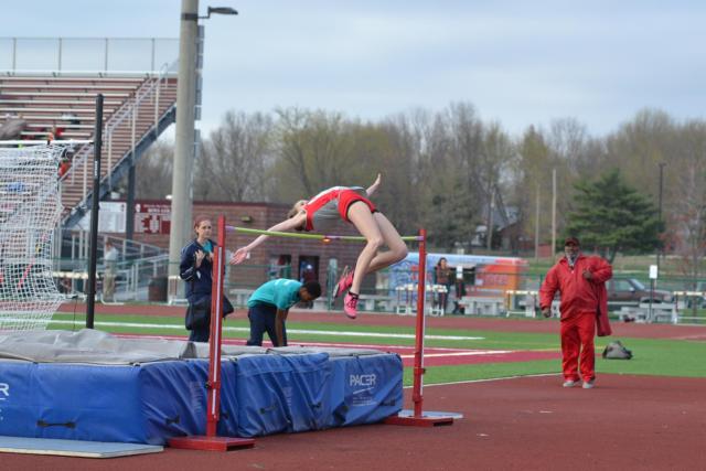Katie Mans has had a remarkable high school start as a freshman at Alton High School, already breaking the school record with a jump of 5-6. (Photo by Dan Brannan)