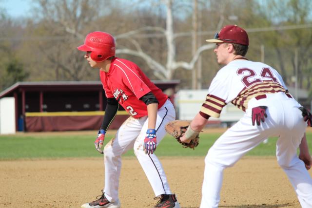 Christian Hunter prepares to get Easton Clark out on first.