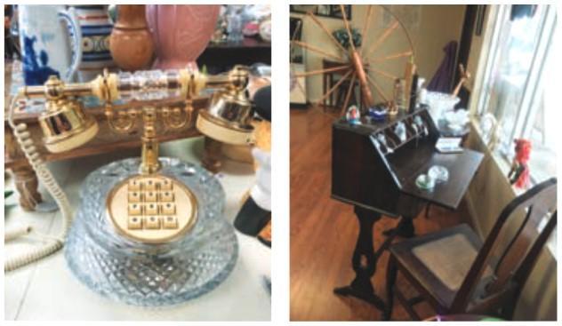 (Left) A rare Galway Irish Crystal Princess Phone, made by Astral Telecom. (Right) One of several old desks at Mulberry's, a spinning wheel, vintage paper weights.