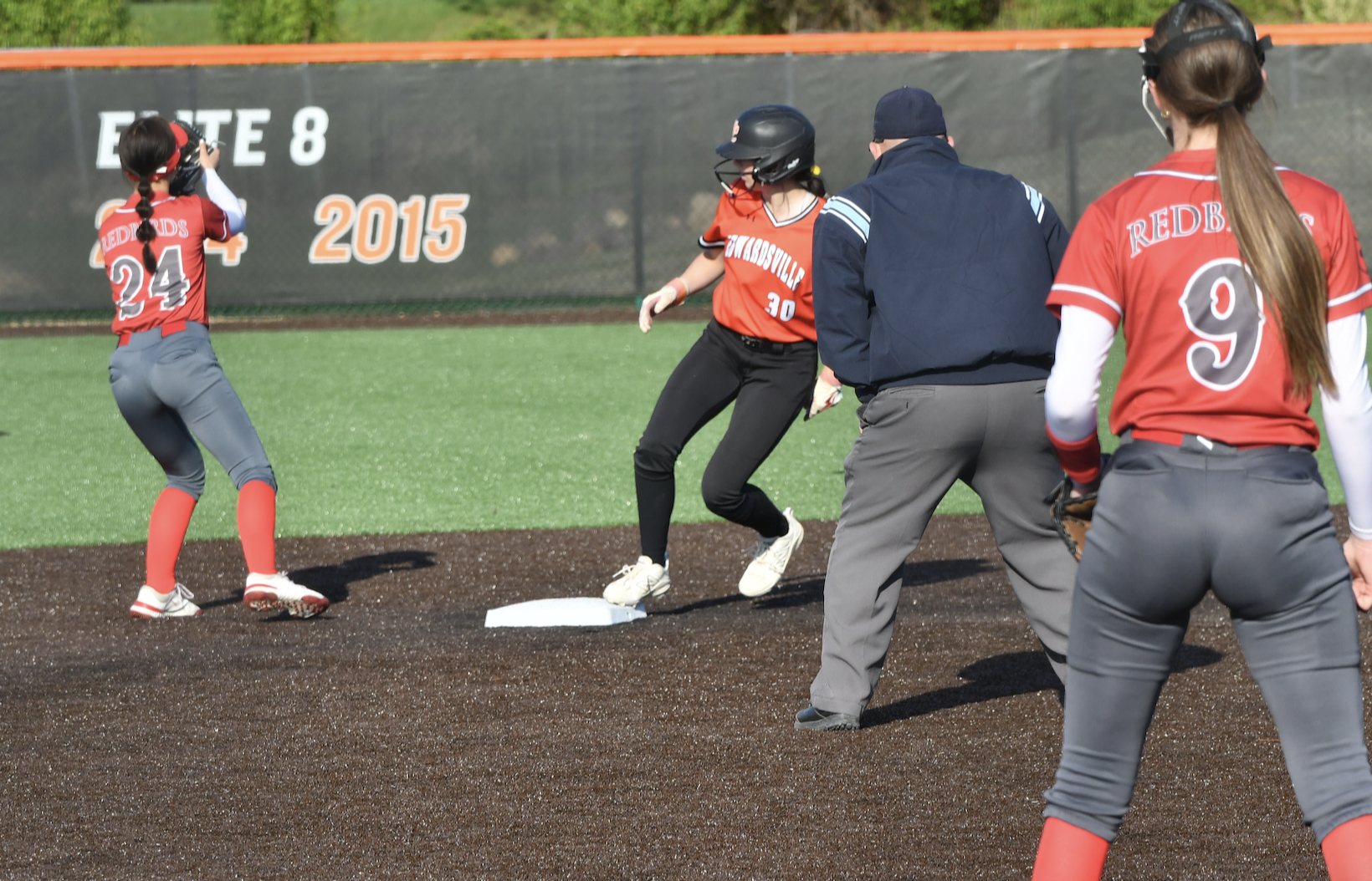 Lily Maxwell dashes into to second base for the Tigers against the Redbirds.