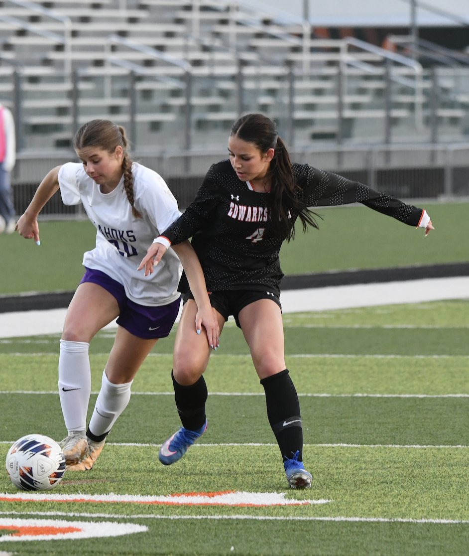 Thea Dimitroff, both top and secondary photo in action against Collinsville. She had a big game with two goals. (Photos by Dan Brannan).