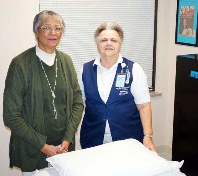 Shirley Wheatley, left, is grateful for the relief she gained in sessions with Ruth Ann Meyer at Alton Memorial Hospital's Healing Touch program