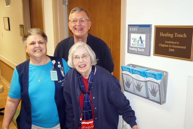The Healing Touch program at Alton Memorial Hospital held an open house Thursday, with retired Chaplain Jo Greenwood, right, the honored guest. She began the program at AMH in 2004. Ruth Ann Meyer, left, is now the Healing Touch coordinator along with Don Wagner.